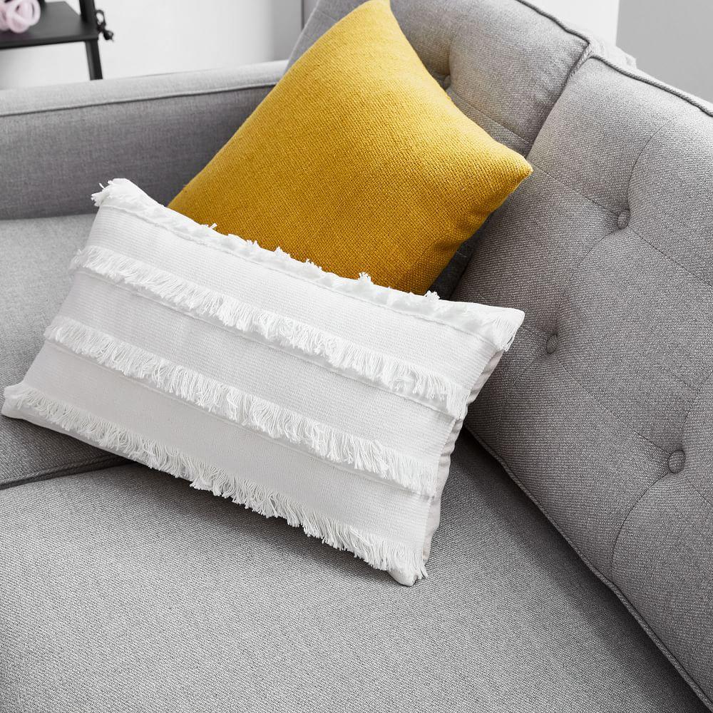 white fringe pillow